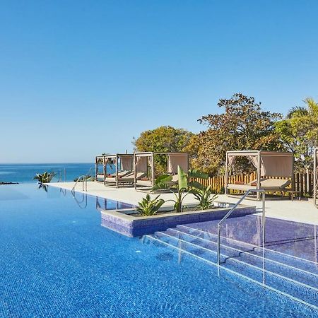 Dreams Lanzarote Playa Dorada Resort & Spa Playa Blanca  Esterno foto Infinity pool at the hotel